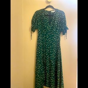 Dark green midi dress with floral print and puff sleeves